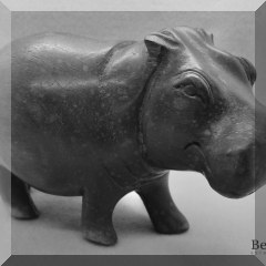 D57a. Carved wood hippo. 6”h - $20 